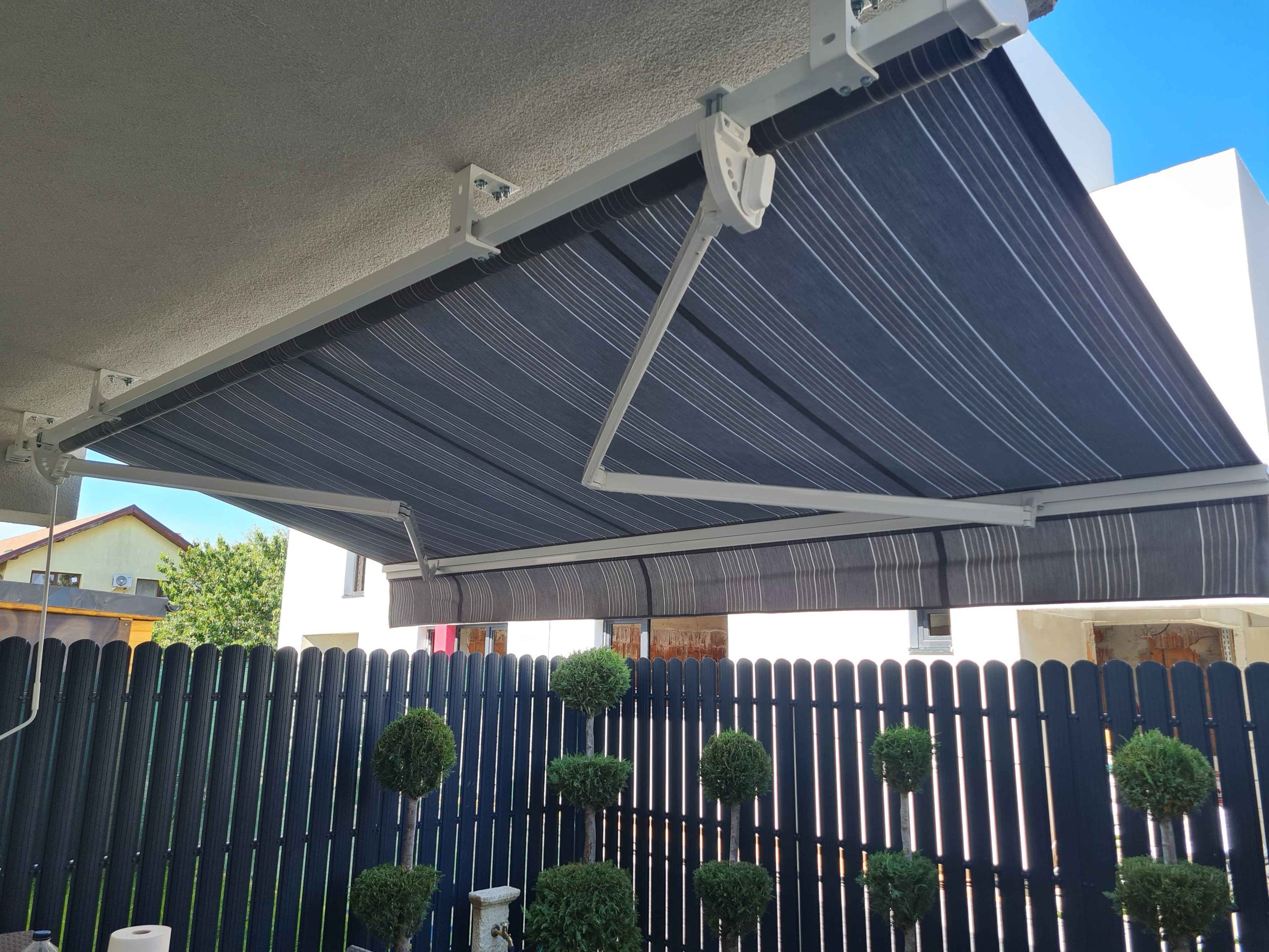 Copertina retractabila cu brate pe bara